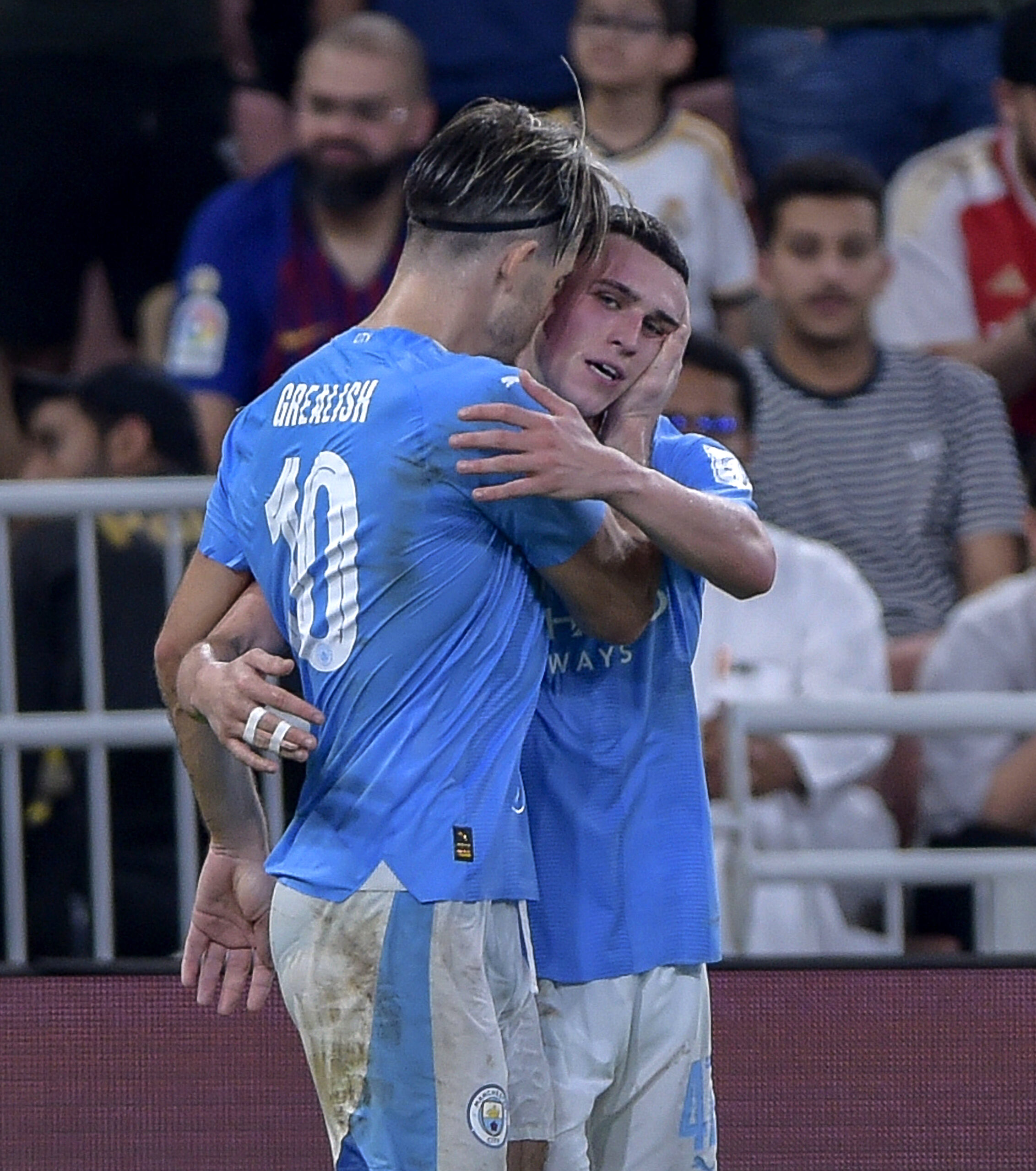 Phil Foden celebrates his goal with team-mate Jack Grealish (PA Wire/PA Wire)