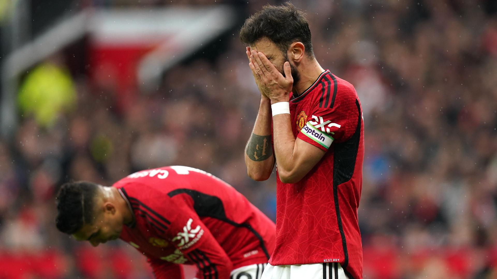 Manchester United players look dejected after losing to Fulham (Mike Egerton/PA Wire)