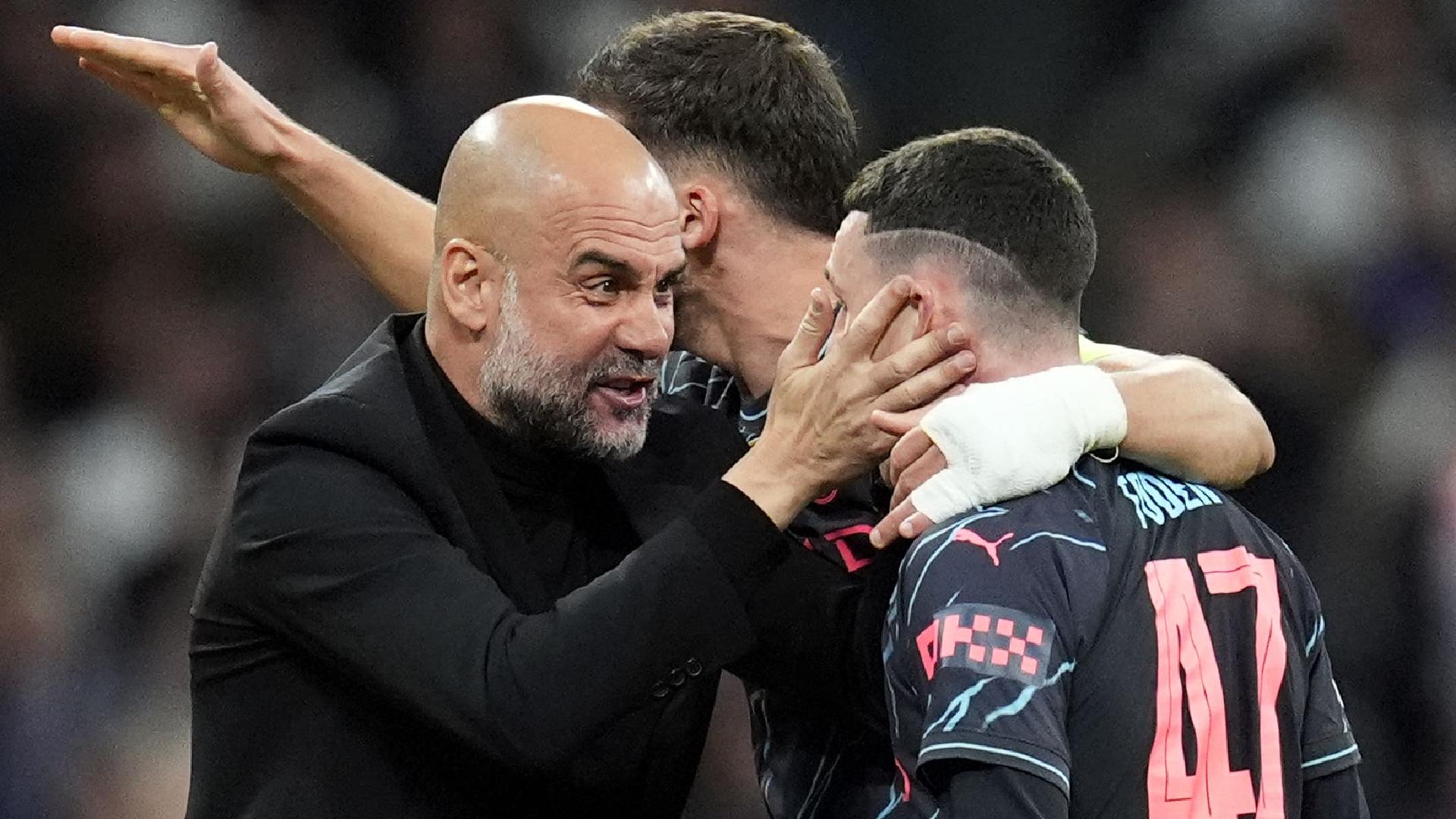 Pep Guardiola and Phil Foden (Nick Potts/PA Wire)